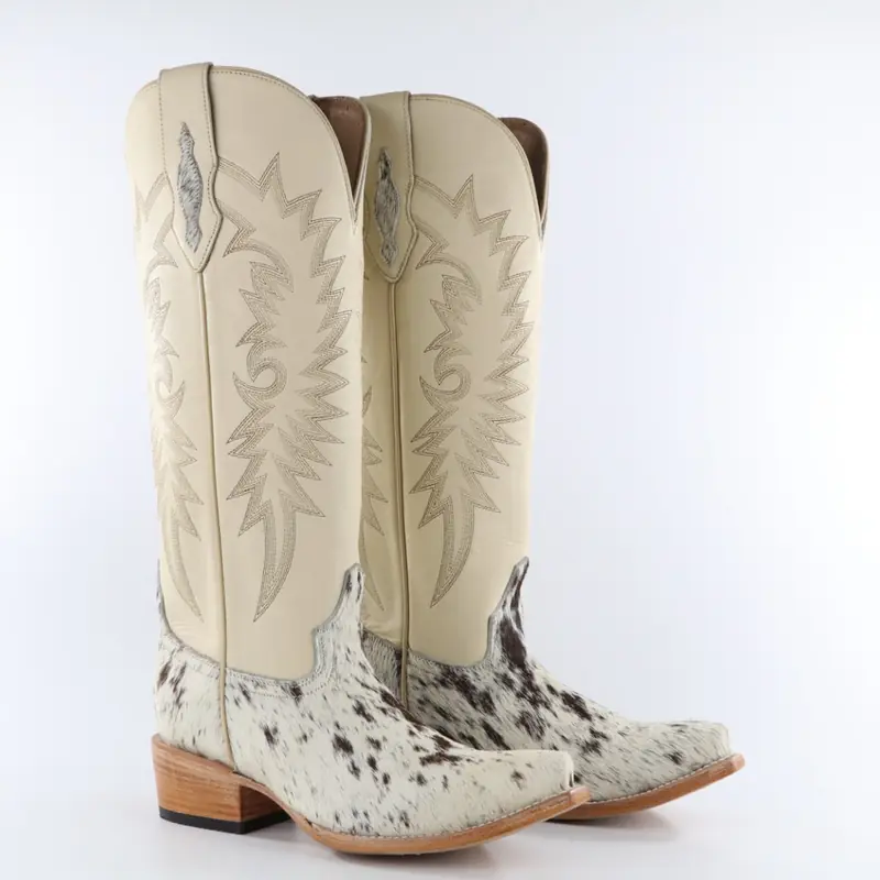 Pair of OAK tall western boots with cream embroidered shafts and hair-on cowhide vamps